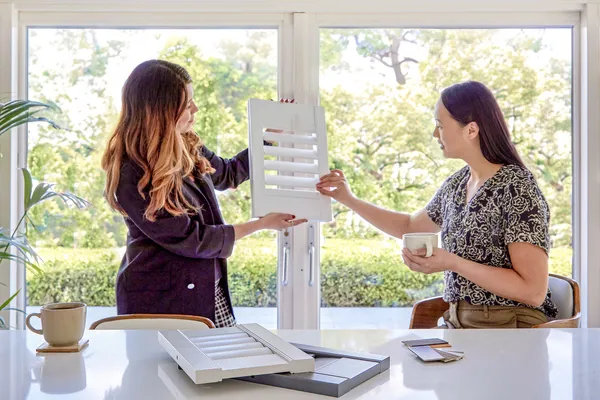 In-house design consultation with a shutter sample